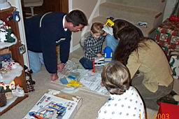 DCP_2337-Ryan assembling Tyler's gift from Craig.JPG